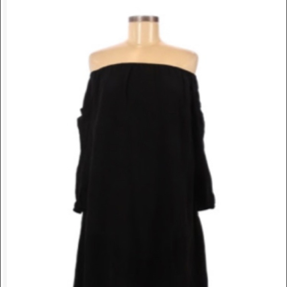 Merritt Charles black dress